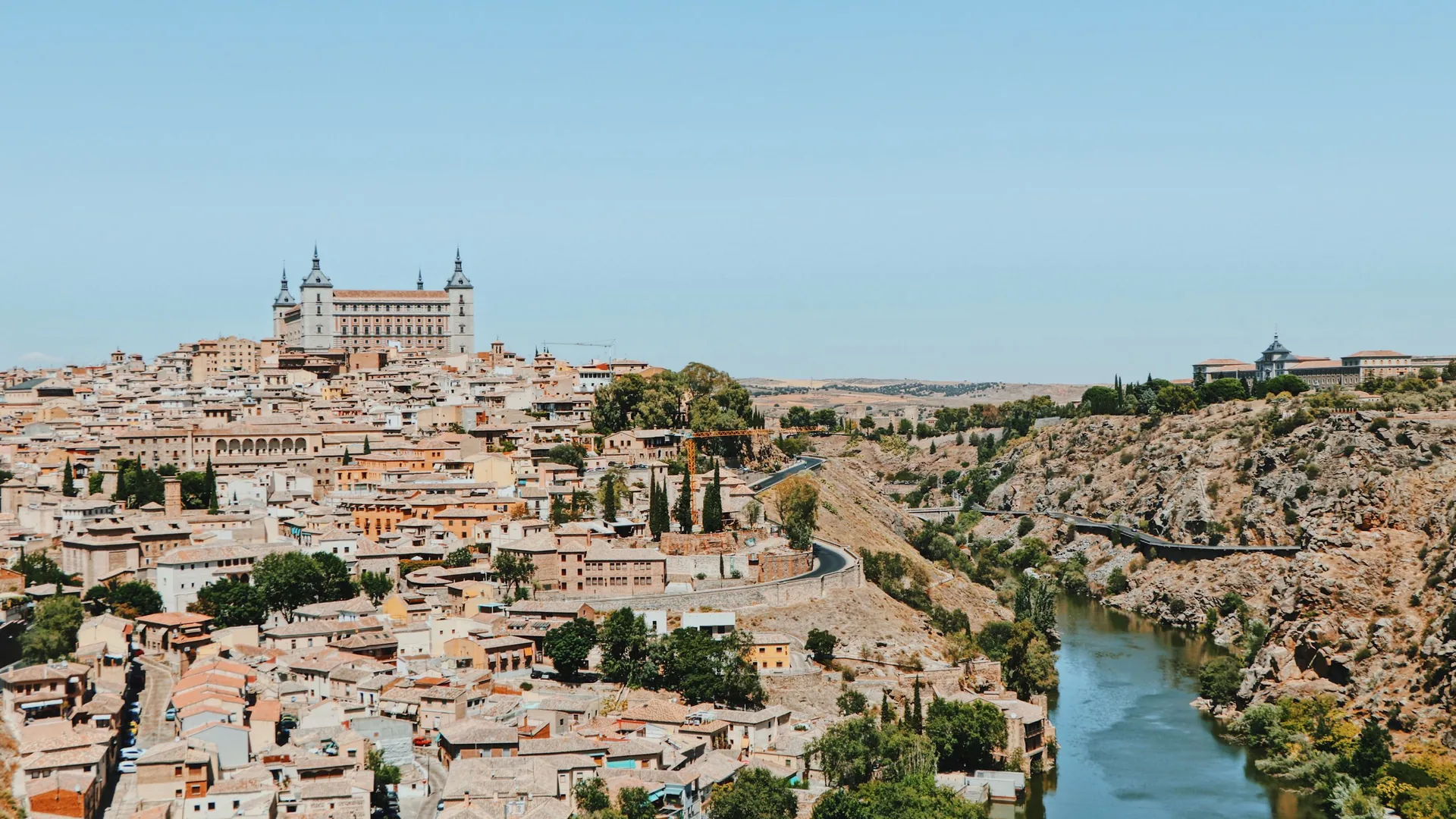 The skyline of Toledo, Spain, on its hill above the Tagus river, with the cathedral and Alcázar